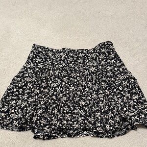 Zara black skirt with cream floral print